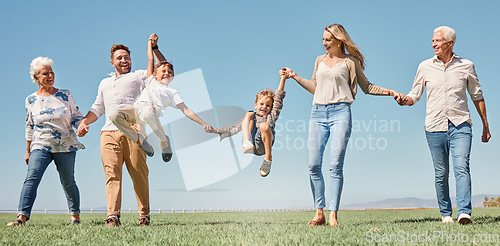 Image of Lift, happy family and summer walk in a field, play and fun in nature together, smile and laugh. Parents, kids and grandparents love enjoying conversation or family time, smile and hold hands outdoor
