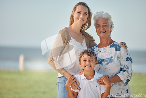 Image of Mother, grandmother and child happy outdoor together with family love and care in nature. Portrait of a elderly woman, mama and kid smile with a hug by grass and water with happiness smiling