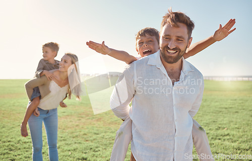 Image of Family, children and piggyback with parents carrying kids outdoor on a field during summer vacation. Happy, love and holiday with a girl, boy and parents on the back of mom and dad outside for fun