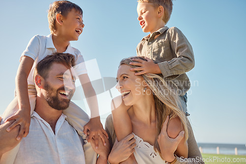 Image of Happy family, travel and beach, kids relax on holiday while playing a shoulder game and having fun at the sea. Family, love and parents carrying children on an ocean trip in Miami, laughing and happy