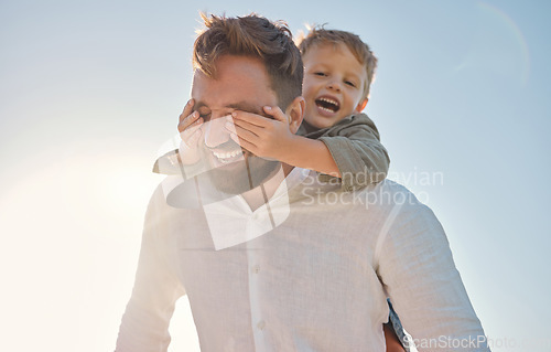 Image of Happy family, father and child hands covering dads eyes at a beach in summer, playing and having fun with surprise, guess and game. Family, hand and kid closing father eye while walking on vacation