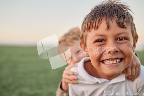 Image of Friends, brothers and a smile, portrait in a field of happy boys having fun and playing in a park. Freedom, selfie and elementary schools children play and hug outside together on summer holiday.