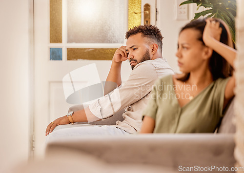 Image of Stress, anxiety and divorce couple on living room sofa in house, home and marriage counseling after fight, argument or cheating. Sad, frustrated and breakup man or woman with mental health or burnout