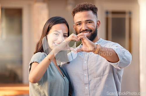 Image of Love, hand and heart with couple in front of house, family and real estate by young homeowner. Hands, happy family and heart shape sign by woman and man buying, moving and excited about relocating