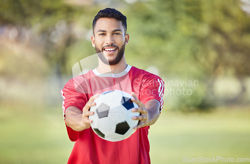 Image of Soccer player, soccerball and sports man with ball after training exercise for game competition. Happy football athlete, smiling and ready for professional athletic sport peformance for match fitness