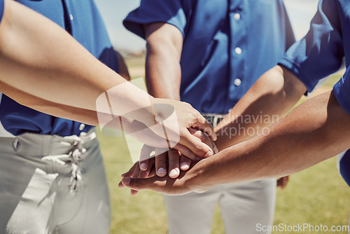 Image of Hands, team and baseball in support, trust and coordination for unity in sports on a field in the outdoors. Hand of people in teamwork piling together in motivation, collaboration or plan to win game