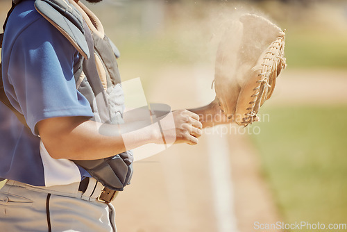 Image of Baseball, sports and man with a ball and glove during training, professional game and competition on the field. Hands of an athlete ready for sport, fitness and cardio in nature, park or pitch