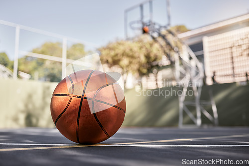 Image of Basketball court, ball and sports match or competition game for fitness, exercise and training in New York. Ball sports, floor and urban community playground for wellness and outdoor sport fun