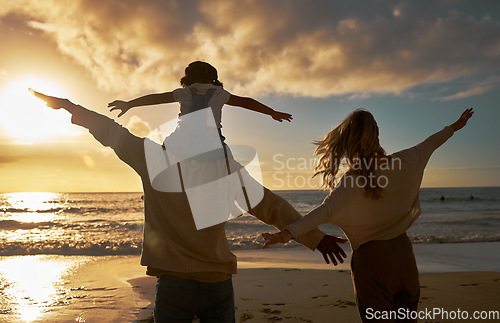 Image of Family, summer and beach fun of a mother, dad and baby enjoying the ocean at sunset. Mama, father and kid with happiness in nature by the sea water happy about vacation and quality time outdoor