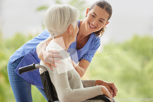 Image of Disability healthcare, nurse and senior patient with support from medical worker in a wheelchair. Disabled elderly woman consulting with a happy doctor or caregiver for medical help in a nursing home