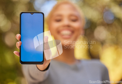 Image of Green screen phone, mockup and woman blue mobile app for advertising, brand and digital marketing space. Hands, smartphone tech and social media, website network and multimedia web design connection