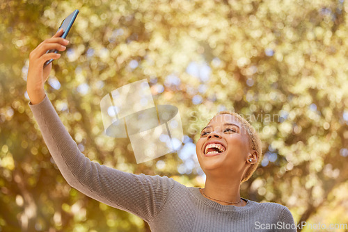 Image of Selfie, phone and young woman, smile and social media, laugh while outdoor in nature and happy. Gen Z girl from mexico and 5g technology, photo and youth, walking outside in garden or park in autumn