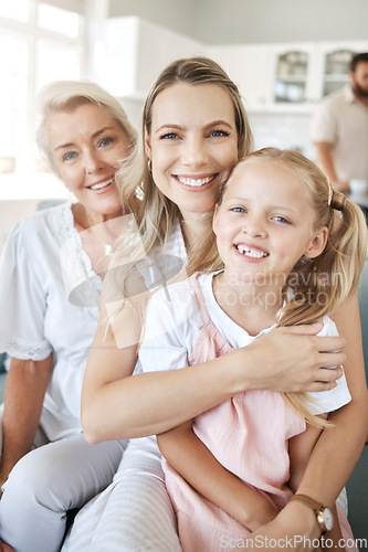 Image of Happy woman in family, home with grandmother and girl child portrait together on sofa in Dublin. Elderly grandma in lounge with women, mama in living room holding daughter and love on mothers day