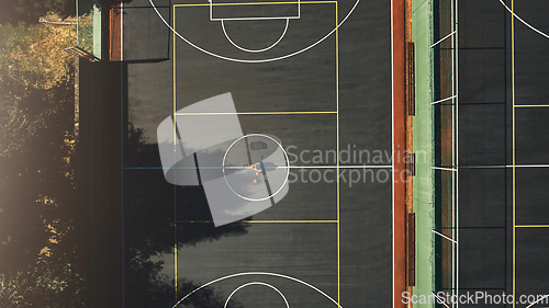 Image of Basketball, sport and fitness, basketball court and game, public sports arena and exercise motivation top view. Athlete, workout and training, basketball player and competition with high angle.