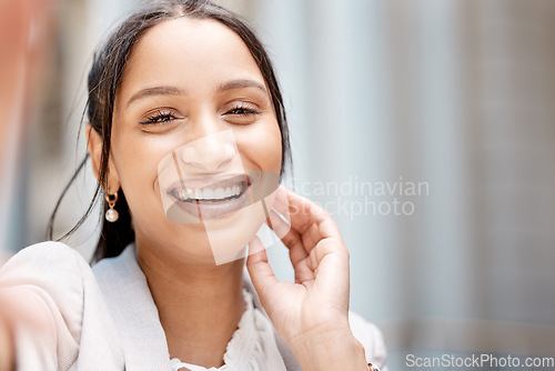 Image of Face, smile and selfie with a happy black woman in the city feeling carefree with mockup. Beauty, head and portrait with an attractive young female taking a photograph or picture alone outside