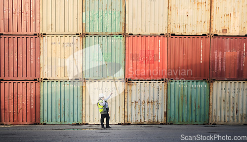 Image of Logistics, shipping yard and cargo containers manager woman talking on phone for communication for import and export at a shipyard. Female engineer and supply chain worker at a port in South African