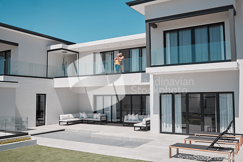 Image of Property, house and senior couple on balcony enjoying sunny day in luxury family home. Retirement, real estate and rich elderly man and woman hugging, embrace and bonding in double story dream home