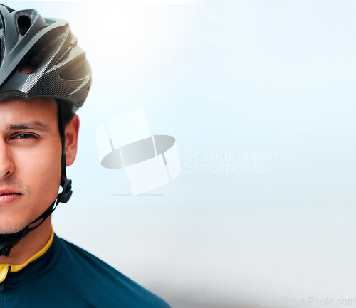 Image of Man, face and bike helmet in training, workout and exercise on mockup space in Canada with cycling motivation, goals or health target. Portrait, sports cyclist and fitness athlete with winner mindset