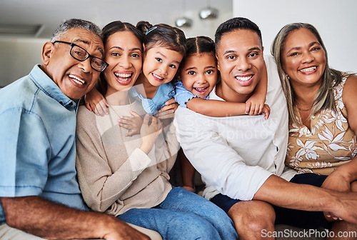 Image of Big family, smile and happiness of a mother, father and kids with grandparents and a hug at a house. Happy dad, children and elderly people feeling love and care hugging in a home with calm smiling