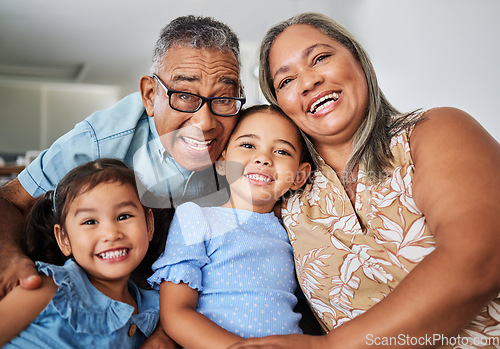 Image of Black family, grandparents and portrait with children while happy, love and bonding in home together. Elderly, man and woman with kids, girl and happiness for smile, care and vacation in living room