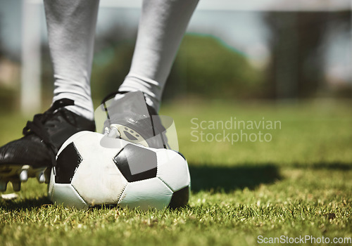 Image of Soccer player feet, deflated soccer ball and sports, competition game and training on grass field, pitch and lawn. Closeup footballer boots puncture, broken and decrease air problem of flat equipment