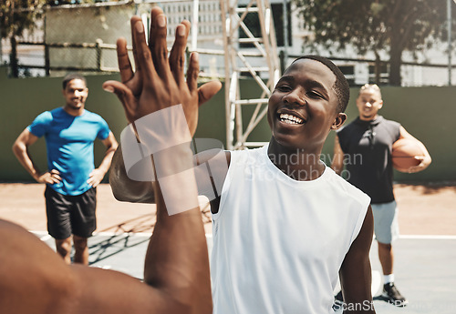 Image of Teamwork, high five or basketball in zoom for support, motivation or game on basketball court. Happy, team health or diversity for sport, games fitness success for team building in workout with smile