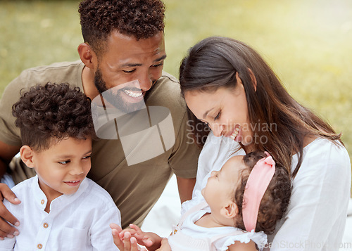 Image of Happy family, love and baby relax in a garden, laughing and bond while playing on grass in a backyard. family kids and parents enjoying quality time in a park together, talking and embracing children