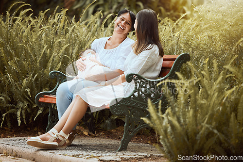 Image of Women, baby care and outdoor nature park of a mother, child and friend talking together. New mama and a woman spending quality time talking about motherhood in the summer sun by green plants
