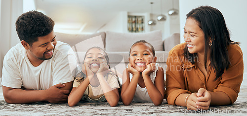 Image of Love, happy family and lying relax on floor together in living room at home, bonding spend quality time and freedom. Carefree, loving parents laughing and young children smile, laugh and relaxing