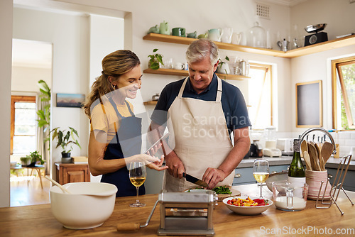 Image of Family, food and elderly couple cooking in kitchen, relax and bond while preparing meal in their home. Love, happy family and retirement with cheerful, elderly and happy man and woman prepare dinner