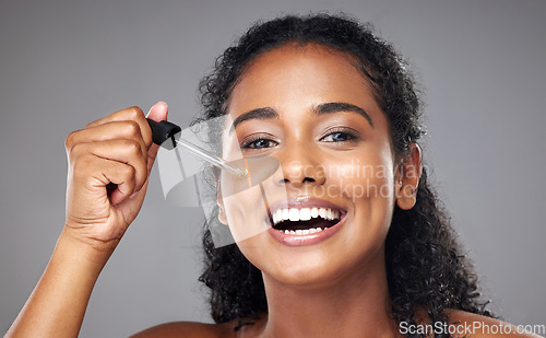 Image of Beauty, face skincare and black woman with serum for glowing skin hydration, anti aging or protection. Happy aesthetic portrait of girl with liquid spa product, facial collagen oil or hyaluronic acid