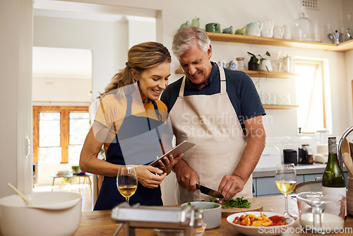 Image of Food, digital tablet and senior couple cooking in kitchen in their home, checking online recipe on internet. Love, family and meal with vegetables for health, wellness and nutrition while streaming