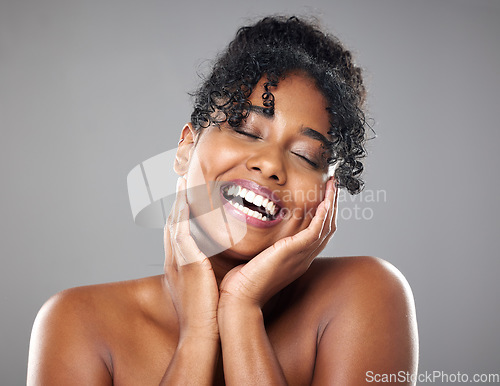 Image of Beauty, skincare and hands on face of woman in studio for health, wellness ad grooming against studio, grey and mockup background. Skin, luxury and cleaning treatment with model after hygiene cleanse