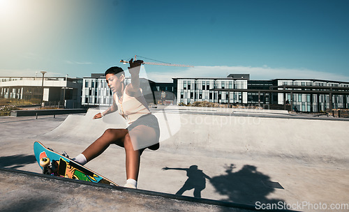 Image of Fitness, girl and skateboarder skateboarding in a skate park for training, cardio workout and sports exercise. New York, skater and urban city black woman skating outdoors in summer for practice