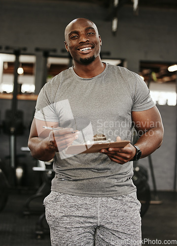 Image of Gym membership, personal trainer and black man holding sign up clipboard for heath and wellness subscription for healthy lifestyle. Portrait of happy male coach holding paperwork to join fitness club