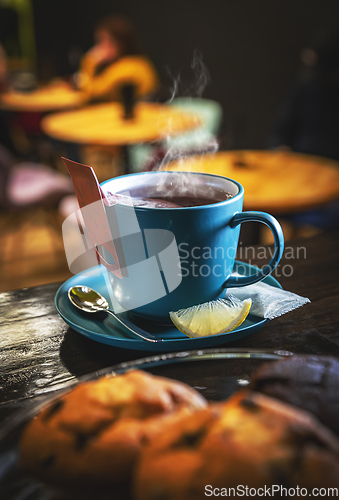 Image of Blue tea cup and teabag