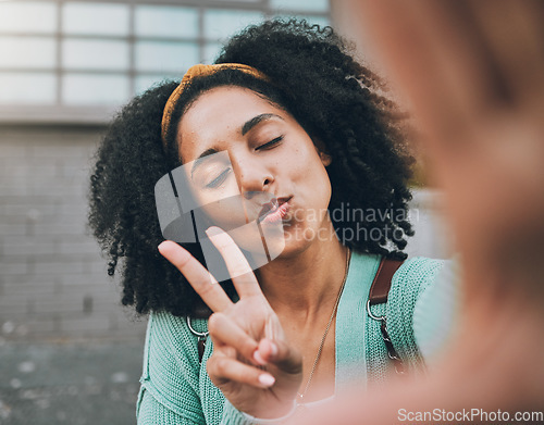 Image of Selfie, peace and black woman pouting in the city for social media, internet or a mobile app. Young, trendy and face of an African girl with photo smile, fashion and hand sign for the web online