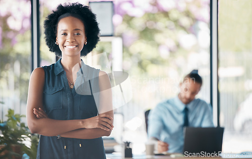 Image of Ceo, business and manager working as management at an executive corporate company. Portrait of a black woman, worker or boss with arms crossed, pride and smile for happiness at a professional office