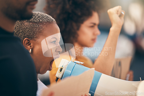 Image of Voice, megaphone and protest for women with human rights, equality and justice with community solidarity, government and politics. Activism crowd, black people fist or african group freedom of speech