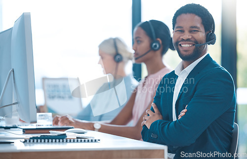 Image of Call center, telemarketing and happy customer service consultant consulting, talking and helping in the office. Smile, telecom and African insurance sales agent working at a communications company