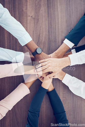 Image of Teamwork, collaboration and motivation business people hands connect together in office. Group staff hand for goal, community together for team project or company growth mission and trust from above