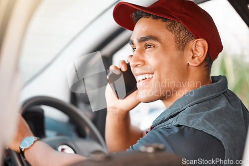 Image of Phone call, driving and courier talking on a mobile while doing a delivery. Happy, young and driver working in logistics, ecommerce or transportation industry speaking on a smartphone in a car