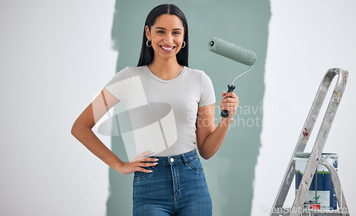 Image of Home renovation, green paint or woman painting for room interior wall or creative maintenance project. DIY, roller or girl holding paintbrush for inspiration, construction or design motivation