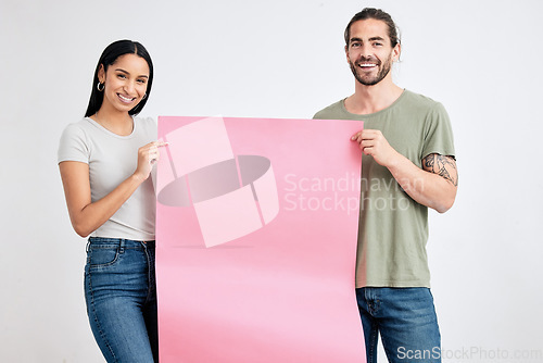 Image of Mock up, banner advertising and young man and woman smile with pink poster for marketing or product placement. Blank space design, sign cardboard and models for branding or logo advertisement