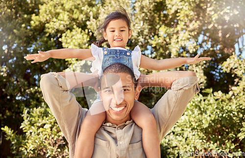 Image of Girl child on shoulder of father, forest adventure with trees .or happy family portrait in San Francisco. Holiday in woods park, young children love nature in summer or daughter trust dad with smile