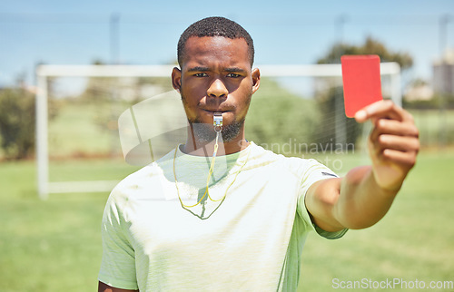 Image of Red card, soccer referee and whistle for warning, decision and wrong action, foul or penalty on sports field pitch. Football umpire, black man portrait and judge caution soccer player error with sign