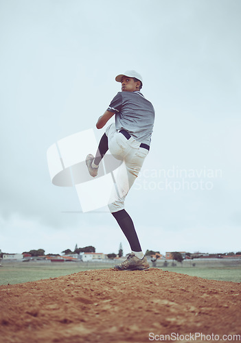 Image of Man, baseball and pitcher in sports throw or competitive match to score point or win on the field outdoors. Professional baseball player in sport stance ready to pitch the ball in serious competition