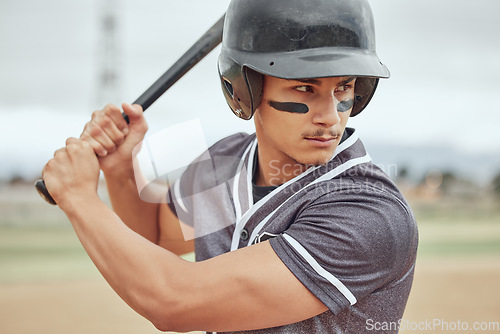 Image of Baseball player, bat and athlete on a field ready for the game or training with motivation, focus and champion mindset. Softball, fitness and sports man playing a professional match on outdoor pitch