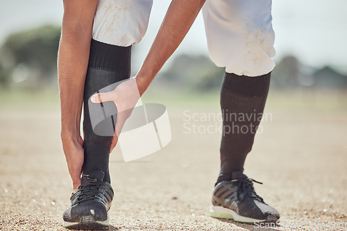 Image of Sports, field and man with ankle injury after game, competition or baseball performance workout. Emergency, training accident or athlete legs in pain after fitness, exercise or running on grass pitch