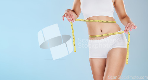 Image of Health, wellness and weightloss, woman with measuring tape on waist, healthy diet and exercise for body care. Fitness, nutrition and healthcare, motivation for fit lat stomach and tracking progress.